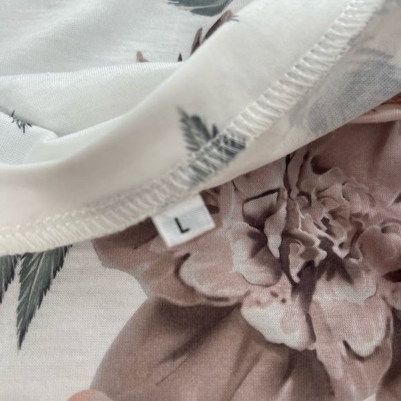 Boutique Floral V Neck Tee with Rolled Sleeves and a Longer Loose Fit - Picture 13 of 14